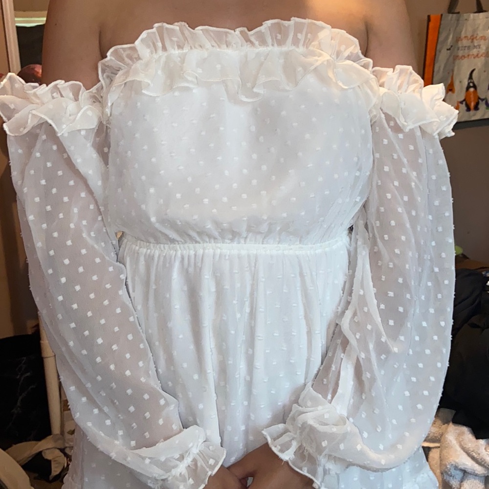 Same dress, different colors and both have a unique design on it.
